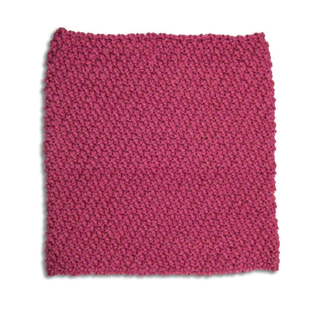 Ręcznie robiony na drutach malinowy komin wełniany SERENE